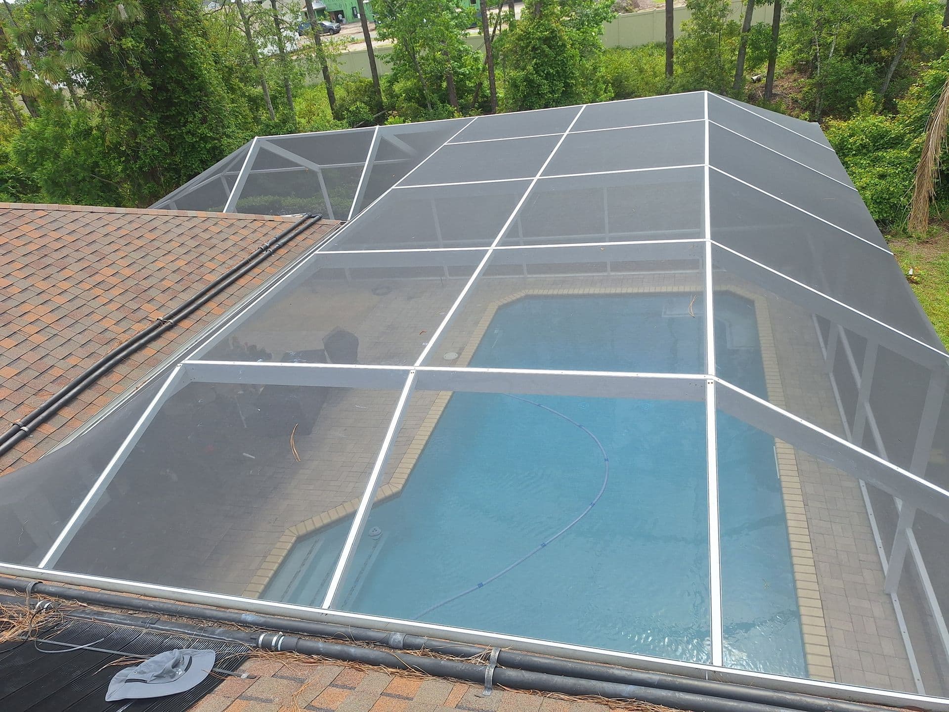 Pool cage frame and screen installation by D.R. Screening